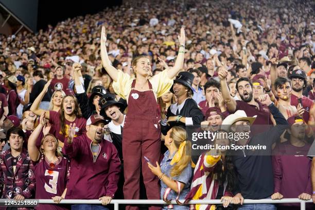 Florida State Seminoles fans cheer during a college football game against the Florida Gators on Nov 25, 2022 at Doak Campbell Stadium in Tallahassee,...