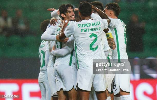 Paulinho of Sporting CP celebrates with teammates after scoring a goal during the Liga Bwin match between Sporting CP and SC Farense at Estadio Jose...