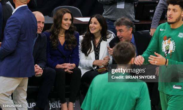 Britain's Prince William, Prince of Wales, and Britain's Catherine, Princess of Wales speak with Emilia Fazzalari and her husband Celtics owners Wyc...