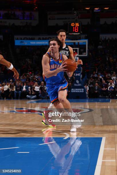 Josh Giddey of the Oklahoma City Thunder drives to the basket during the game against the San Antonio Spurs on November 30, 2022 at Paycom Arena in...