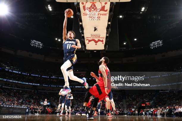 Dyson Daniels of the New Orleans Pelicans drives to the basket during the game against the Toronto Raptors on November 30, 2022 at the Smoothie King...