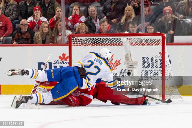 Jack Quinn of the Buffalo Sabres scores the game winning overtime shoot out goal on Alex Nedeljkovic of the Detroit Red Wings to defeat the Detroit...