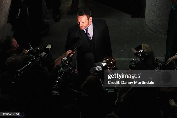 Actor Michael Fassbender of "Shame" walks with the Coppa Volpi for Best Actor he won during the Award Winners" Photocall during the 68th Venice...