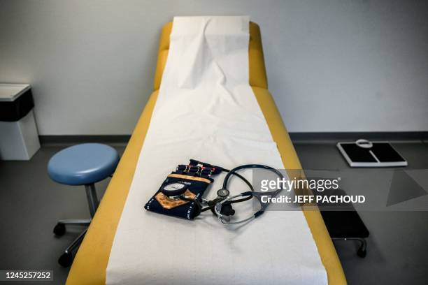 This photograph taken on November 24, 2022 shows a doctors office at the Pontgibaud health house, central France. - Midwives, dermatologists,...