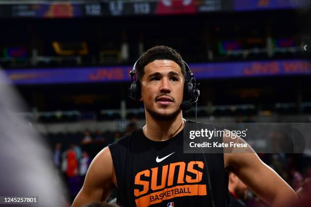 Devin Booker of the Phoenix Suns is interviewed after his 51-point performance coupled with the win against the Chicago Bulls on November 30, 2022 at...