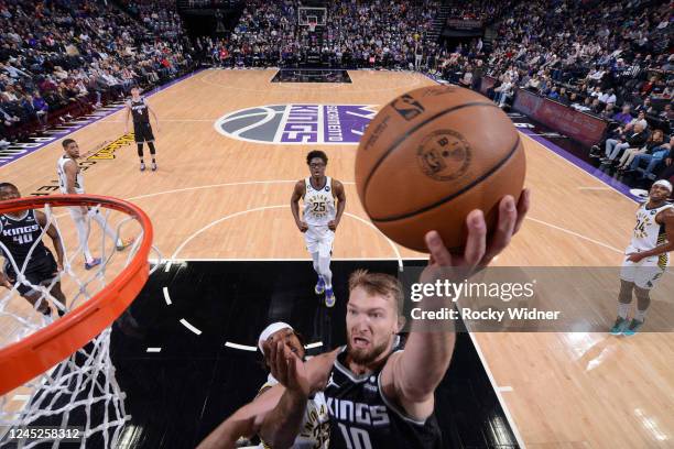 Domantas Sabonis of the Sacramento Kings drives to the basket during the game against the Indiana Pacers on November 30, 2022 at Golden 1 Center in...