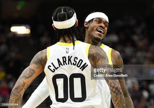 Jarred Vanderbilt of the Utah Jazz celebrates with Jordan Clarkson during the second half against the Los Angeles Clippers at Vivint Arena on...