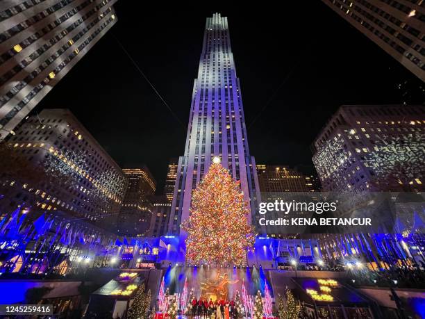 The Christmas tree at Rockefeller Plaza in New York City is lit on November 30, 2022.