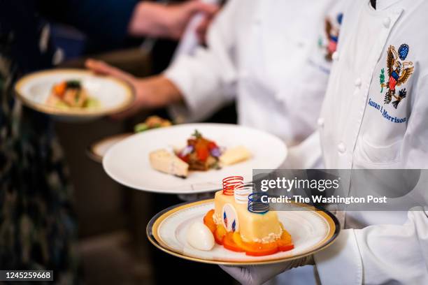 November 30, 2022: White House Executive Chef Cris Comerford and White House Executive Pastry Chef Susie Morrison present the dishes on the menu...