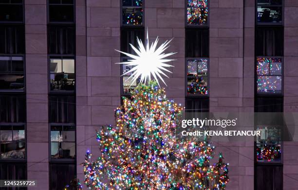 The Christmas tree at Rockefeller Plaza in New York City is lit on November 30, 2022.