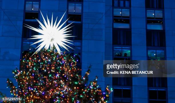 The Christmas tree at Rockefeller Plaza in New York City is lit on November 30, 2022.