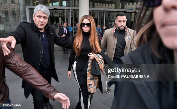 Colombian singer Shakira leaves the court in Barcelona on December 1 after she has attended the ratification of the separation demand with his ex...