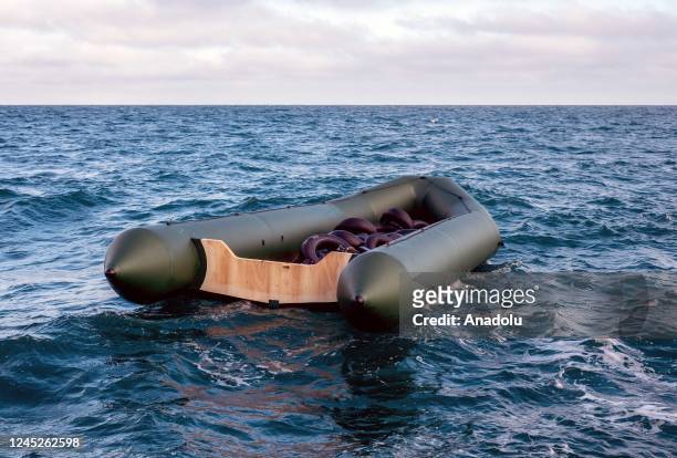 Dinghy drifting in the English channel is seen that had been used by Migrants to cross to the UK and left out at sea in Kent, United Kingdom on...