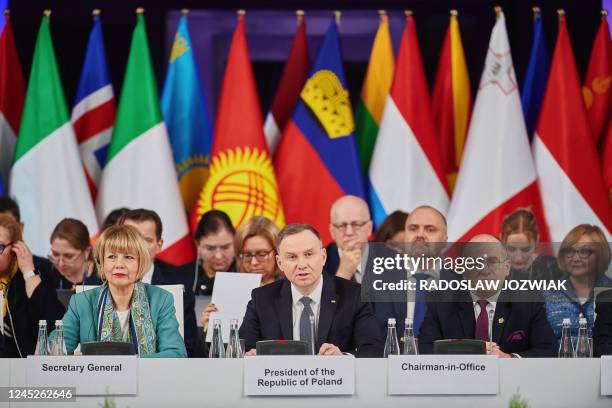 Secretary General of the OSCE Helga Maria Schmid, Poland's President Andrzej Duda and Poland's Foreign Minister Zbigniew Rau attend the 29th...