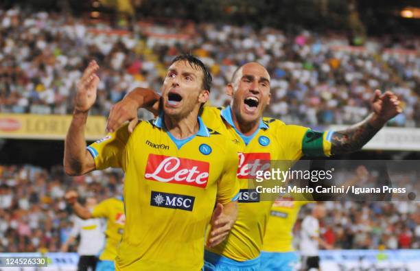 Hugo Campagnaro celebrates with his team-mate Paolo Cannavaro after scoring a goal during the Serie A match between AC Cesena and SSC Napoli at Dino...