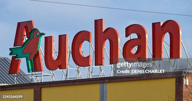 This photograph taken on November 28 in Englos, northern France, shows the logo of 'Auchan'.