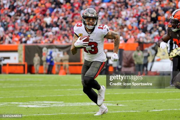Tampa Bay Buccaneers wide receiver Mike Evans runs after making a catch during the third quarter of the National Football League game between the...
