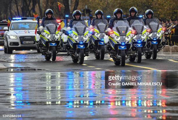 Romanian police escort the military parade on Romania's National Day in Bucharest, on December 1, 2022.