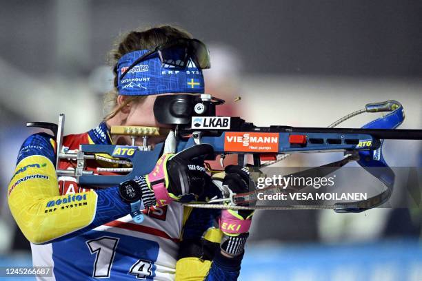 Sweden's Elvira Oberg competes at the shooting range during the women's 4x6km relay event of the IBU Biathlon World Cup in Kontiolahti, Finland on...