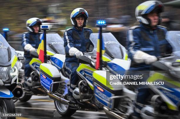 Romanian police escort the military parade on Romania's National Day in Bucharest, on December 1, 2022.