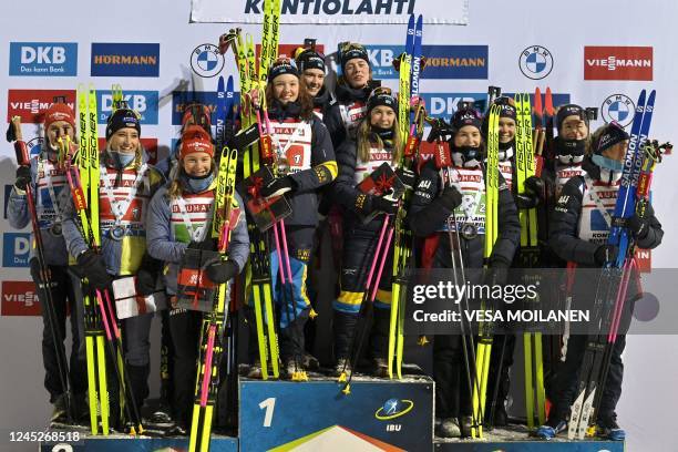 Second placed team Germany , winner team Sweden and third placed team Norway pose on the podium of the women's 4x6km relay event of the IBU Biathlon...