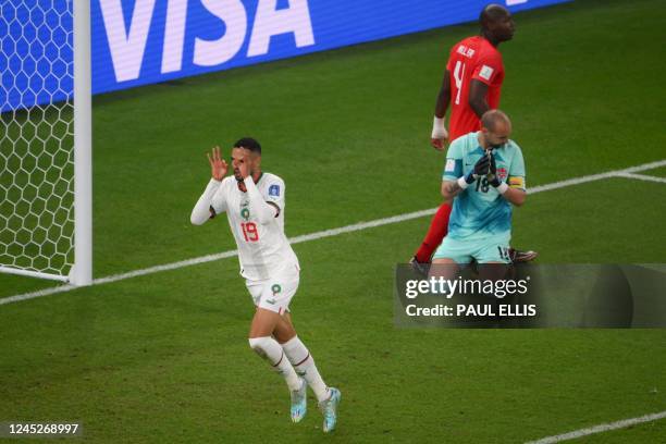 Morocco's forward Youssef En-Nesyri celebrates after he scored his team's second goal past Canada's goalkeeper Milan Borjan during the Qatar 2022...