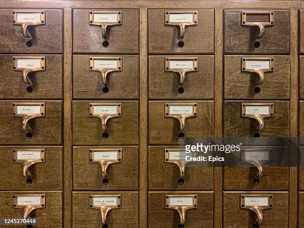 General view of wooden filing cabinets containing reference cards at the underground preservation facility which houses the famed Bettmann...