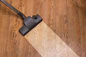 floor cleaning of linoleum with vacuum cleaner