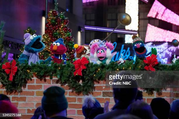 Pictured: Cookie Monster, Elmo, Tango, Abby Cadabby, Grover --
