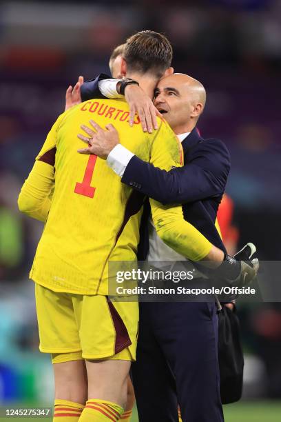 Belgium coach Roberto Martinez hugs Belgium goalkeeper Thibaut Courtois during the FIFA World Cup Qatar 2022 Group F match between Croatia and...