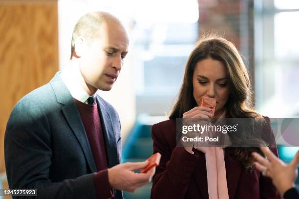 Britain's Prince William, Prince of Wales, and Catherine, Princess of Wales smell soap during a visit to the Greentown Labs in Somerville, to learn...