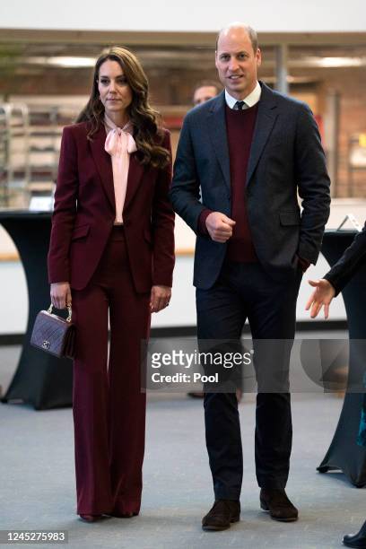 Britain's Prince William, Prince of Wales, and Catherine, Princess of Wales during a visit to the Greentown Labs in Somerville, to learn about...