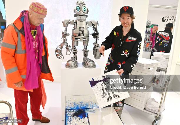 Andrew Logan and Philip Colbert attend the unveiling of Philip Colbert's Lobstar Bots, on view at Phillips' London galleries in Berkeley Square until...