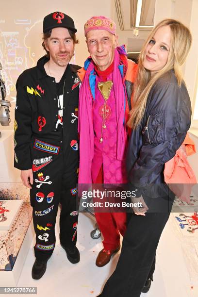 Philip Colbert, Andrew Logan and Charlotte Colbert attend the unveiling of Philip Colbert's Lobstar Bots, on view at Phillips' London galleries in...