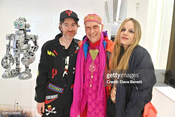 Philip Colbert, Andrew Logan and Charlotte Colbert attend the unveiling of Philip Colbert's Lobstar Bots, on view at Phillips' London galleries in...