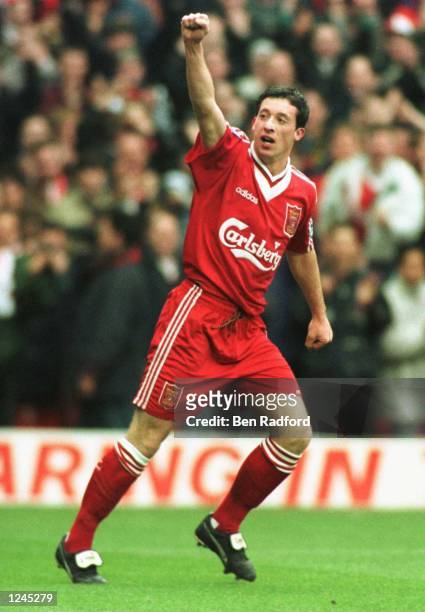 Robbie Fowler of Liverpool celebrates scoring the third goal against Aston Villa during the Premiership game at Anfield today. Mandatory Credit: Ben...