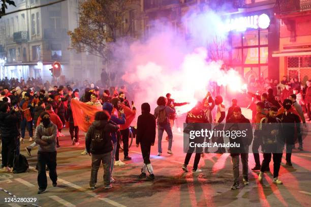 Moroccans living in Brussels celebrate after Morocco advanced to the last 16 of the World Cup following the FIFA World Cup Qatar Group F match...