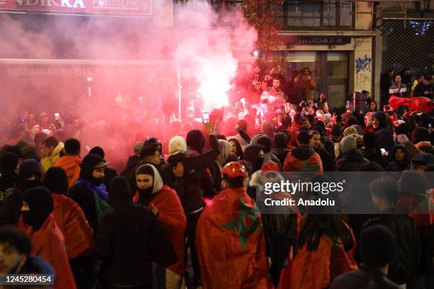 Moroccans living in Brussels celebrate after Morocco advanced to the last 16 of the World Cup following the FIFA World Cup Qatar Group F match...