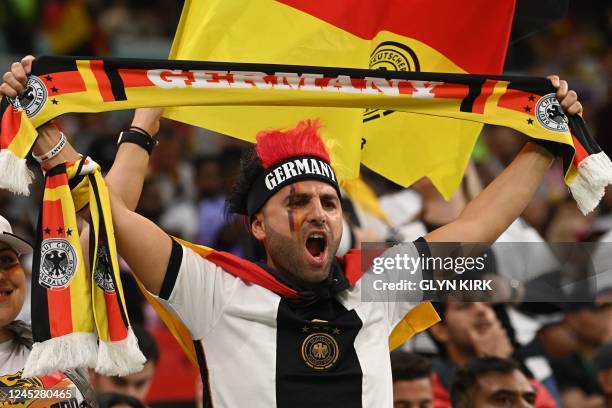 Germany supporter cheers ahead of the start of the Qatar 2022 World Cup Group E football match between Costa Rica and Germany at the Al-Bayt Stadium...