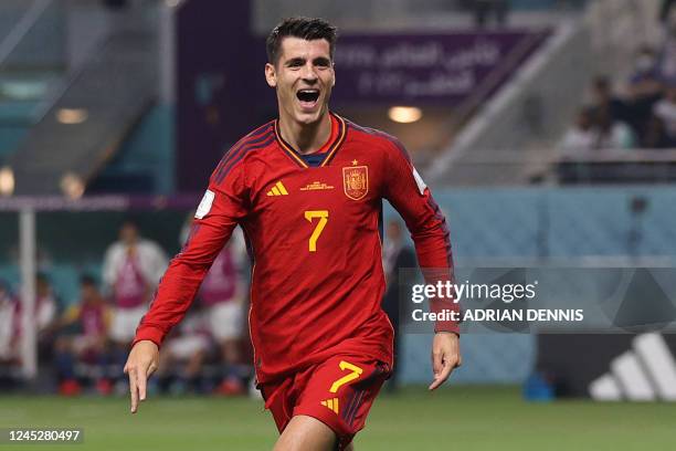 Spain's forward Alvaro Morata celebrates scoring his team's first goal during the Qatar 2022 World Cup Group E football match between Japan and Spain...