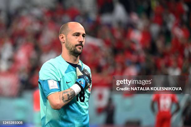 Canada's goalkeeper Milan Borjan reacts after his team lost the Qatar 2022 World Cup Group F football match between Canada and Morocco at the...