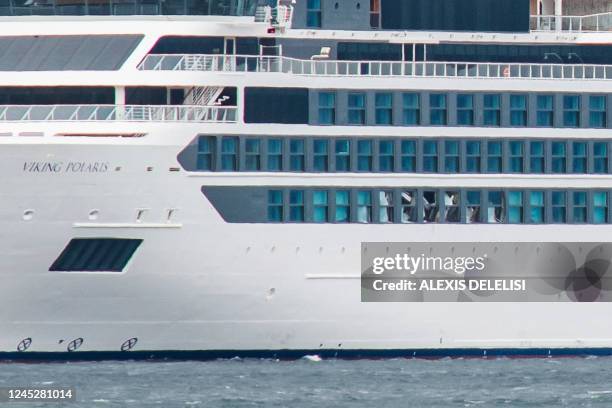 Viking Polaris ship of norwegian flag, is seen anchored in waters of the Atlantic Ocean in Ushuaia, southern Argentina, on December 1, 2022. - One...