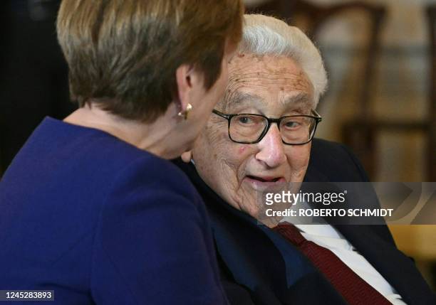 Former US Secretary of State Henry Kissinger talks with Deborah Rutter, President of The John F. Kennedy Center during a luncheon at the US State...