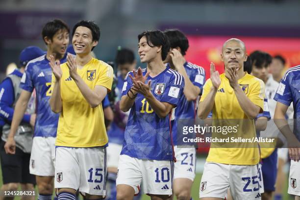 Daichi Kamada, Takumi Minamino and Daizen Maeda of Japan the FIFA World Cup Qatar 2022 Group E match between Japan and Spain at Khalifa International...