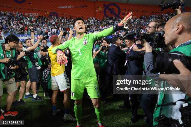Japan goalkeeper Eiji Kawashima celebrates qualification to the last 16 during the FIFA World Cup Qatar 2022 Group E match between Japan and Spain at...