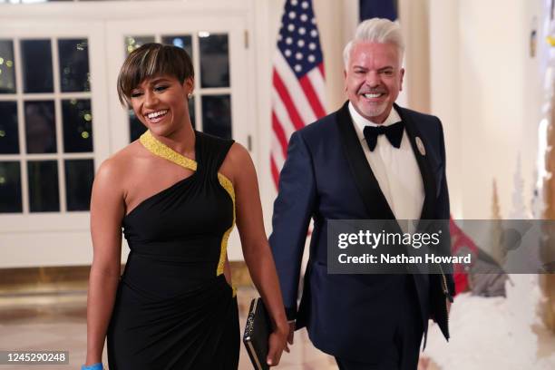 Actress Ariana DeBose and Henry Munoz III arrives for the White House state dinner for French President Emmanuel Macron at the White House on...