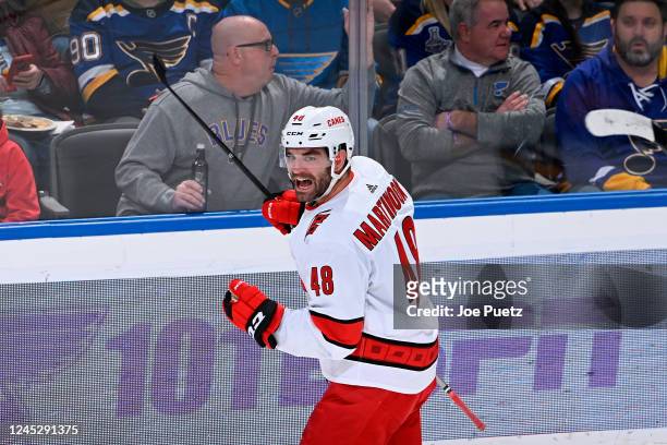 Jordan Martinook of the Carolina Hurricanes reacts after scoring a goal against the St. Louis Blues at the Enterprise Center on December 1, 2022 in...