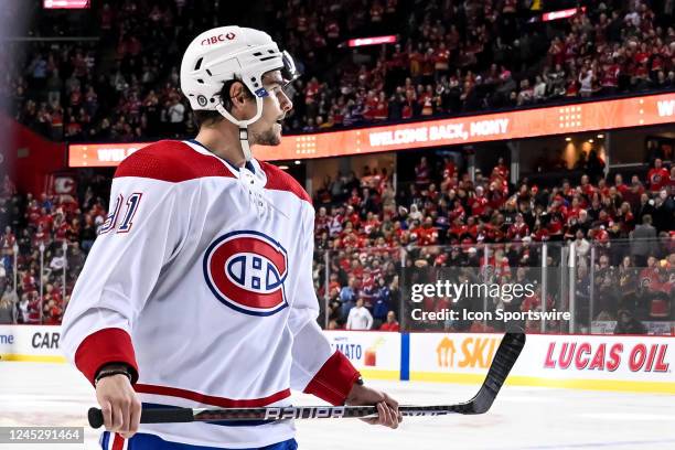 Montreal Canadiens Center Sean Monahan is given a salute by the crowd during the first period of an NHL game between the Calgary Flames and the...