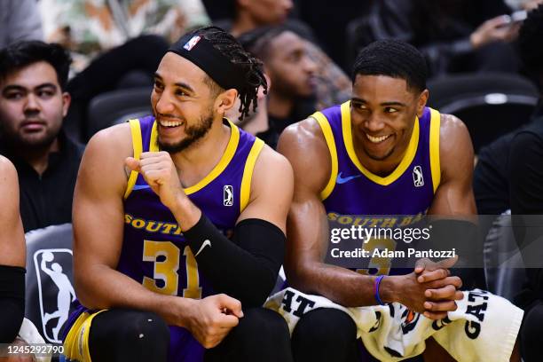 Devin Cannady of the South Bay Lakers and Shaquille Harrison of the South Bay Lakers smile on the bench during the game against the Salt Lake City...