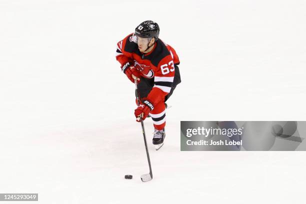 Jesper Bratt of the New Jersey Devils moves the puck up ice during the 1st period 6against the Nashville Predators at Prudential Center on December...